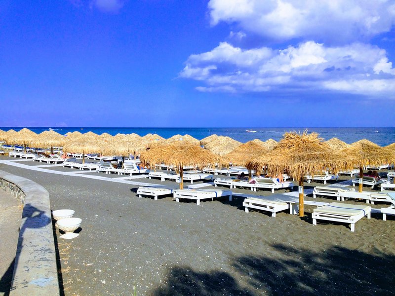 Perivolos Black Sand Beach